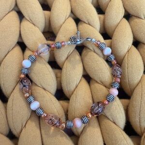Elegant Beaded Bracelet with Pink and Silver Accents